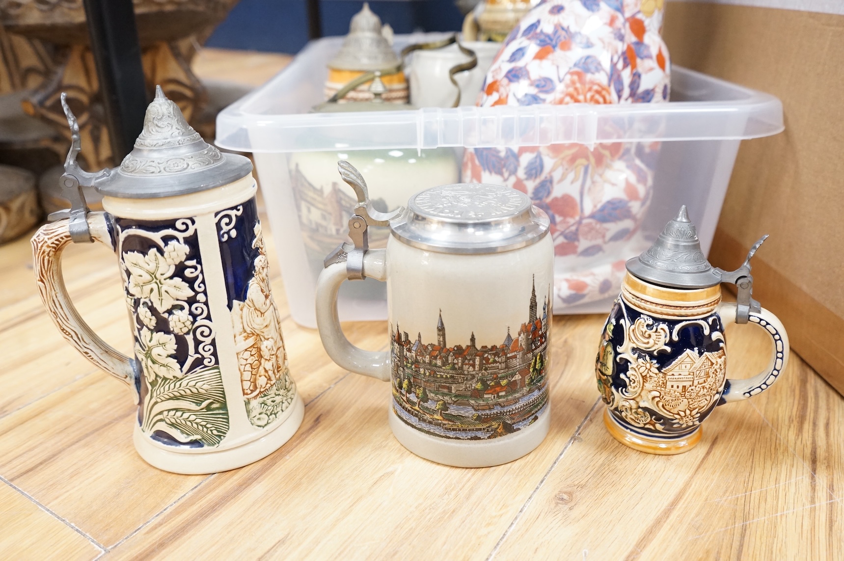 A collection of German ale steins and an Imari seated cat-37cm high